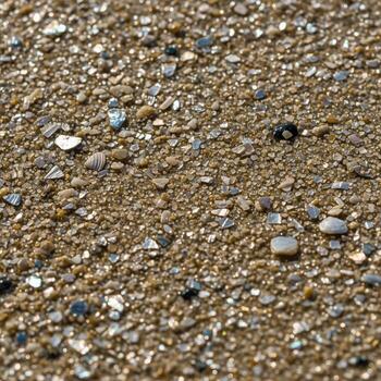 Close up view of a textured surface composed of small varied pebbles and shimmering particles creating a natural abstract pattern photo