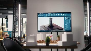 tyst tömma kontor Plats i en modern verklig egendom utveckling fast visar 3d modeller urban layout på tabell, arkitektur design verktyg Begagnade i hus och sanering planera. bemästra planen. video
