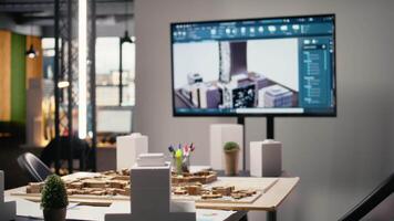 tömma arkitektur och konstruktion kontor Begagnade för möten med planera, fast egendom investering strategier och zonindelning föreskrifter diskussion. 3d byggnad modeller och ritningar eller programvara. video