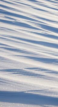 Abstract ripples of light reflecting on a calm water surface creating a serene and soothing visual texture photo
