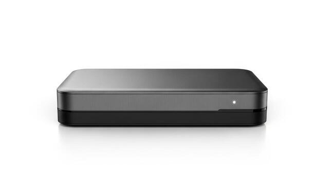 Sleek black external hard drive or media player isolated on a white background with a subtle reflection. photo