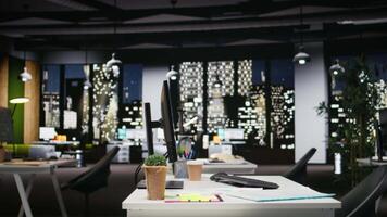 Empty business office is equipped with resources and dual monitors, digital tools for forecasting, report writing and developing business strategy to drive efficiency and workplace performance. video