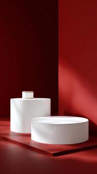 Modern Minimalist Display Featuring Geometric Shapes in a Striking Red Background photo