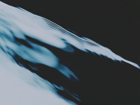 Abstract blue and black design flowing in modern art style photo