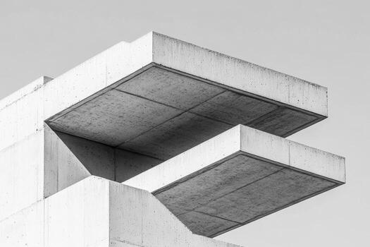 Modern concrete architecture showcases unique geometric design photo