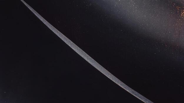 de cerca Mira a curvo línea en brillante superficie a noche foto