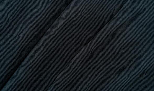 Textured surface of black fabric with subtle patterns photo