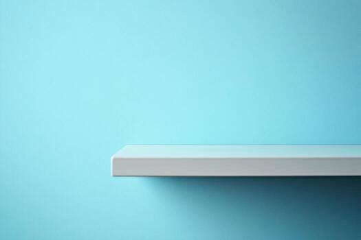 Simple white shelf against a light blue wall background photo