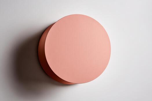 Simple round pink shape on a light background photo