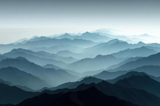 Scenic view of layered mountains at dawn photo