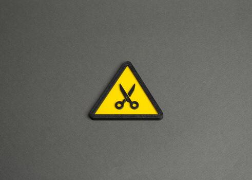 Cutting Scissors. Budget cuts, salary and benefit reductions. Staff reductions. Reduction in operating hours and services. Reduction, optimization, and financial restraint. photo