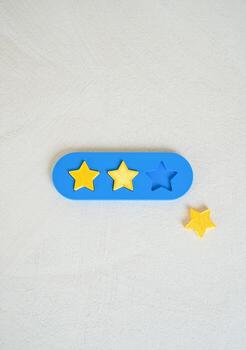 Loss of one star out of three. Decline in popularity. Comment, request for correction, and fix. Feedback for the developers. Rating systems, customer support, and digital product improvement concepts. photo
