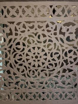 A decorative wall panel with intricate designs photo