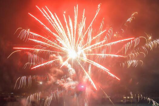 Beautiful colorful fireworks against a dark sky background. Selective focus, background, texture photo