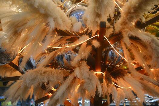 A tree with a bunch of feathers on it photo