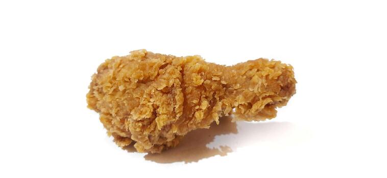 Studio Shot of Crunchy Fried Chicken Drumstick Isolated on White Background. Clipping Path photo