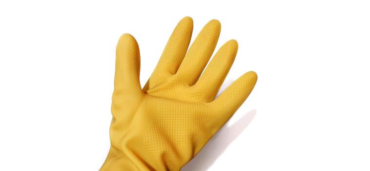 Hand gesture in yellow rubber glove showing five fingers, stop palm gesture isolated on a white background photo