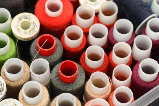Sewing Thread Spools Close-Up Texture Pattern photo