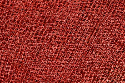 Red plastic net texture or background. Abstract background and texture for design photo