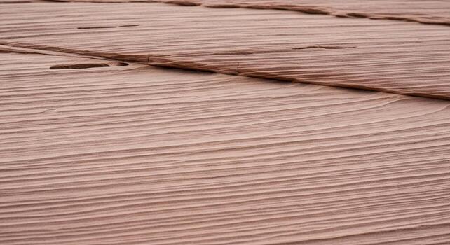 cerca arriba resumen ver de texturizado rosado tela con sutil variaciones en color y lineal patrones foto