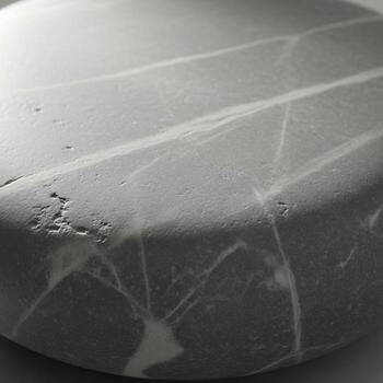 Close up abstract view of a textured gray surface with subtle lines and imperfections under soft lighting conditions photo