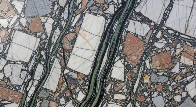 Abstract close up of a complex marble surface featuring irregular white brown and dark green veins creating a dynamic natural pattern photo