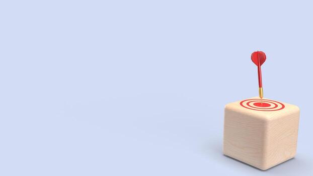 A wooden block with a dart sticking out of it photo