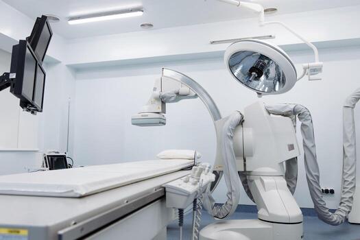 Advanced angiograph machine in a modern medical facility, featuring sleek design and high-tech components, ready for diagnostic imaging procedures in a sterile environment with copy space photo