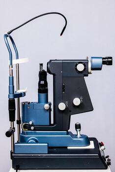 Ophthalmic examination device, featuring advanced laser technology, positioned on a clean surface, highlighting precision engineering and functionality for vision correction procedures photo