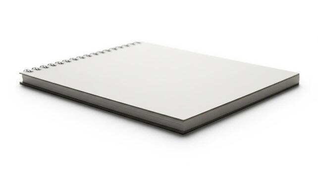 A blank notebook on a white surface photo
