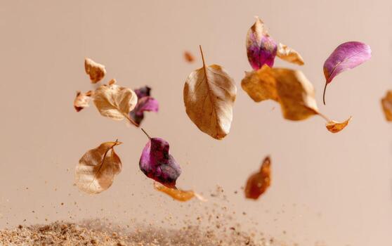 Leaves dance in soft beige background creating a graceful autumn scene photo
