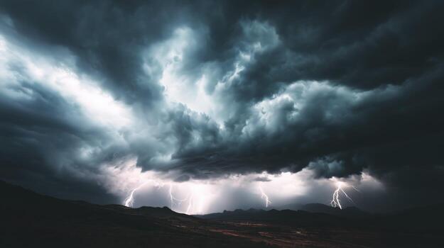 Dark Storm Clouds Over Vast Landscape with Lightning Strikes Illuminating the Sky photo