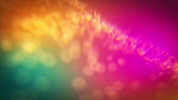 Captivating blurred light background in a spectrum of green, yellow, and magenta, with a flowing stream of glowing particles creating an artistic, dreamy atmosphere video
