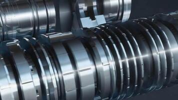 Close up of intricate metal gears and cylinders in a complex industrial machine assembly process textures patterns background video