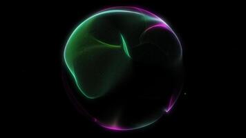lysande rosa och grön flytande sfär med mjuk energi reflektioner och vätska rörelse. abstrakt lysande klot slinga animering i 4k. video