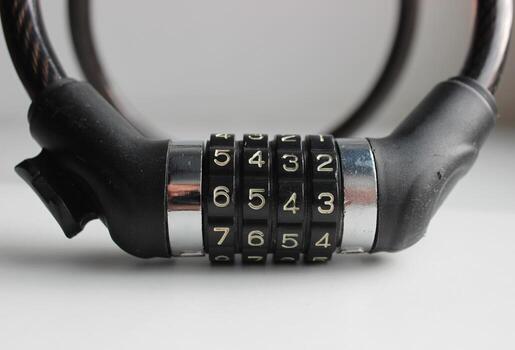 Random Rows of Numbers on a Black 4 Digit Lock. Selecting a Cipher for Combination Locks Illustrative Photo