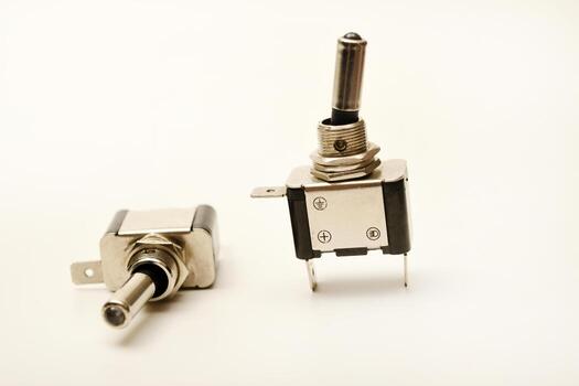 Micro toggle switch. Small mechanical part. photo