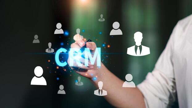 CRM system concept with business person interacting with glowing digital customer icons, representing relationship management, data analytics, communication, technology improving client engagement photo