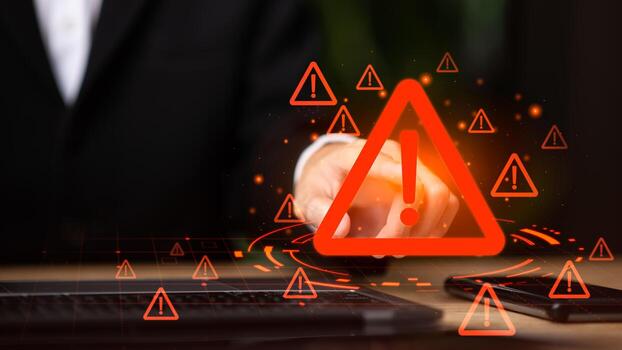 Red glowing warning icon with exclamation mark on digital screen, symbolizing alert notification,cyber security risk,system error, data breach, virus attack, protection, monitoring, danger prevention photo
