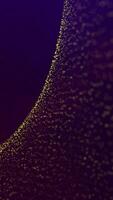 Mesmerizing loop animation of golden particles cascading in dark space video