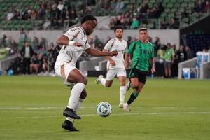 LAFC forward Jeremy Ebobisse (17) stops the ball to kick a goal during the second half against Austin FC at Q2 Stadium. editorial_image