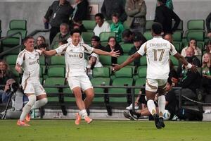 LAFC forward Jeremy Ebobisse (17) celebrates a goal with defender Sergi Palencia (14) and forward Son Heung-Min (7) during the second half against Austin FC at Q2 Stadium. editorial_image