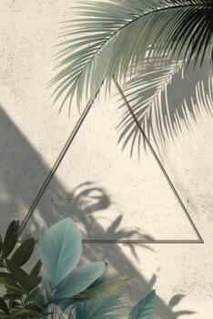 Tropical plants and a triangle frame on a wall photo