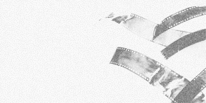 Background with film strip. Grainy form with rough stipple texture dry ink patches and soft threshold transitions. Grit and dust marks cover the aged paper surface. vector