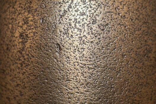 Golden background of an authentic image of an object, zoom on its texture for background and concept, textured photo