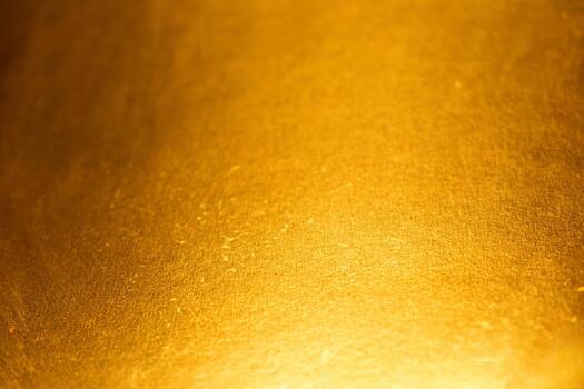 Golden background of an authentic image of an object, zoom on its texture for background and concept, gold photo