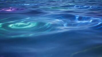 resumen agua superficie con vibrante colores y fluido dinámica, creando un fascinante visual experiencia video