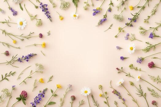 Floral Arrangement in Flat Lay Display with Various Wildflowers on a Beige Background Creating a Circular Frame with Ample Copy Space photo