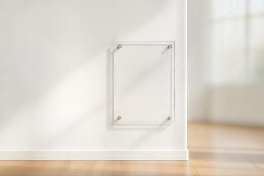 Minimalist Studio Corner Featuring a Blank Frame on a White Wall with Natural Light Streaming Through a Nearby Window Casting Soft Shadows photo