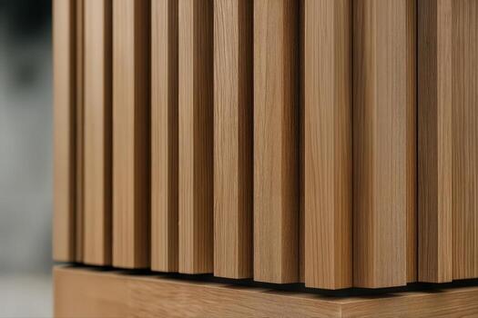 Facade Featuring Vertical Timber Panels Casting Shadows in an Architectural Setting with Natural Light Creating a Warm and Textural Appearance photo